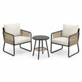 Conjunto de sillas y mesa de aluminio y mimbre color beige y negro